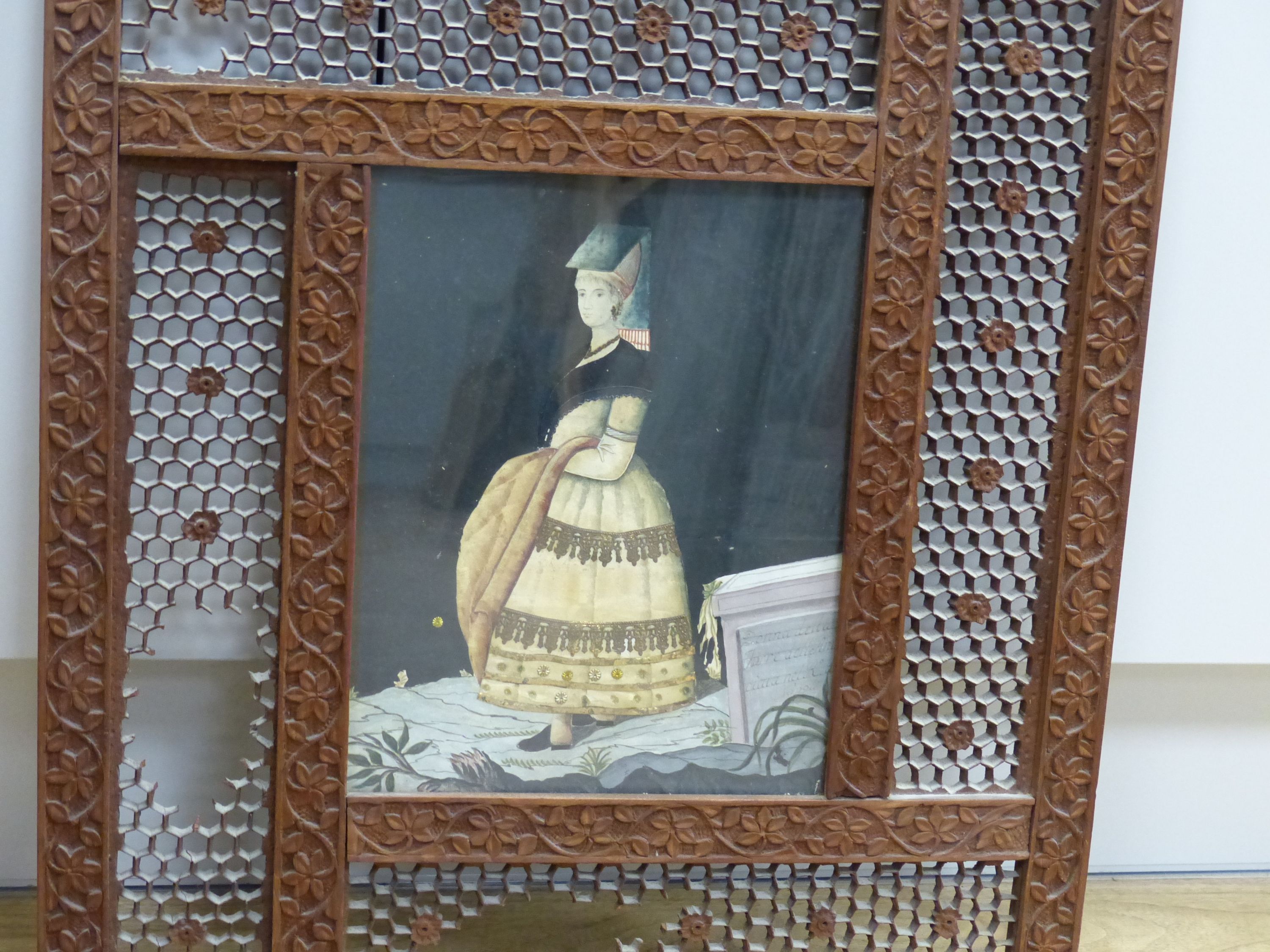 An early 19th century painted silk and gilt metal portrait 24 x 19cm